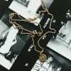 Avaimenperät|Korut>Laura Vartio Mini Smiley Pendant 24K